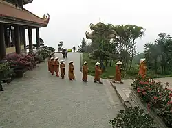 Monks of the Trúc Lâm school of Buddhism of Tây Thiên Zen Monastery are on their way to the refectory