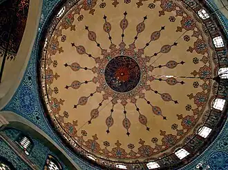 Red cloud collars inside the dome of Sokollu Mehmed Pasha Mosque (1568-1572) in Istanbul, Turkey.
