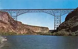 A BASE jumper leaps off the Perrine Bridge