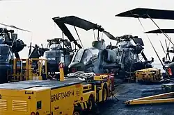Aft flight deck. Photo taken in late 87 or early 88. HM-14's RH-53D and HMLA-169's AH-1W Cobras