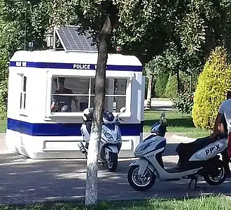 Uzbekistan Police motorcycles and Uzbekistan Police box with solar panel on the roof