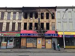 Row of vacant commercial buildings on the 2000 block of W. Pratt Street in Carrollton Ridge, Baltimore
