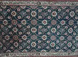 A carpet with Minakhani motif