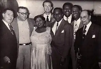 From left: Jack Teagarden, Sandy DeSantis, Velma Middleton, Fraser MacPherson, Cozy Cole, Arvell Shaw, Earl Hines, Barney Bigard at the Palomar Supper Club in Vancouver, B.C. (17 March 1951)