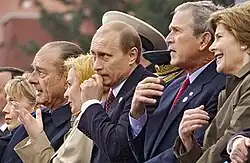 Heads of state (from left to right) : Jacques Chirac, Vladimir Putin and George W. Bush.
