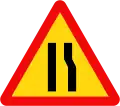 203c: Road narrows ahead on the right side