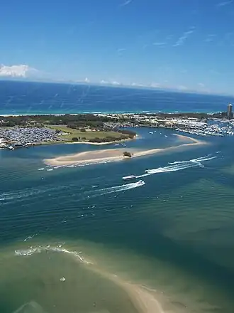 View from a helicopter over Southport across the Broadwater to Main Beach and the Pacific Ocean beyond, 2006