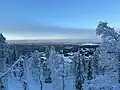 View at dusk looking over the snowy ski town of Levi