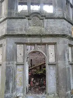 Rear bay of the garden façade, constructed in 1888 with Johnson family crest