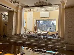 The foyer of the concert hall ‘Officers' house’ after the explosions, littered with pieces of cladding