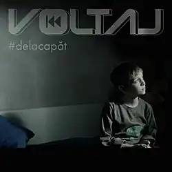 Shot of a kid in an empty dark room.