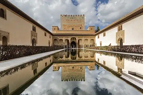The reflecting pool in the Patio de los Arrayanes, at the Moorish Alhambra of Granada, Spain