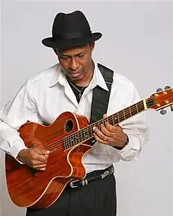 Ian Villafana playing a Solitaire guitar