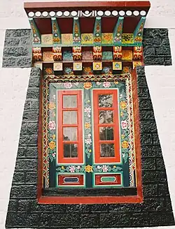 Ornately carved colourful Window of Enchey Monastery