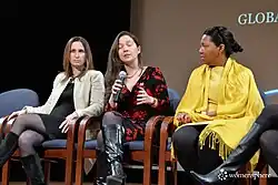 Ballou-Aares and others sitting on stage