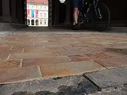 Wood paving may be used indoors as a flooring material