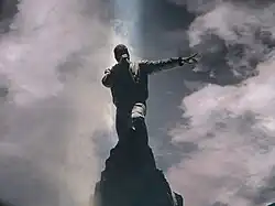 West performing atop a mountain at the Verizon Center on November 21, 2013 in Washington, D.C. on The Yeezus Tour.