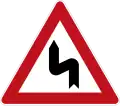 Sign 105-10 Double curve (first left)
