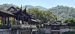 The covered bridge, looking south to Huzhou Mountain (湖洲山).
