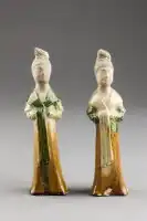 Earthenware figures of female attendants, with coloured lead glazes, Tang dynasty, early 8th century.