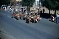 A second group from Yuendumu marching, 1961